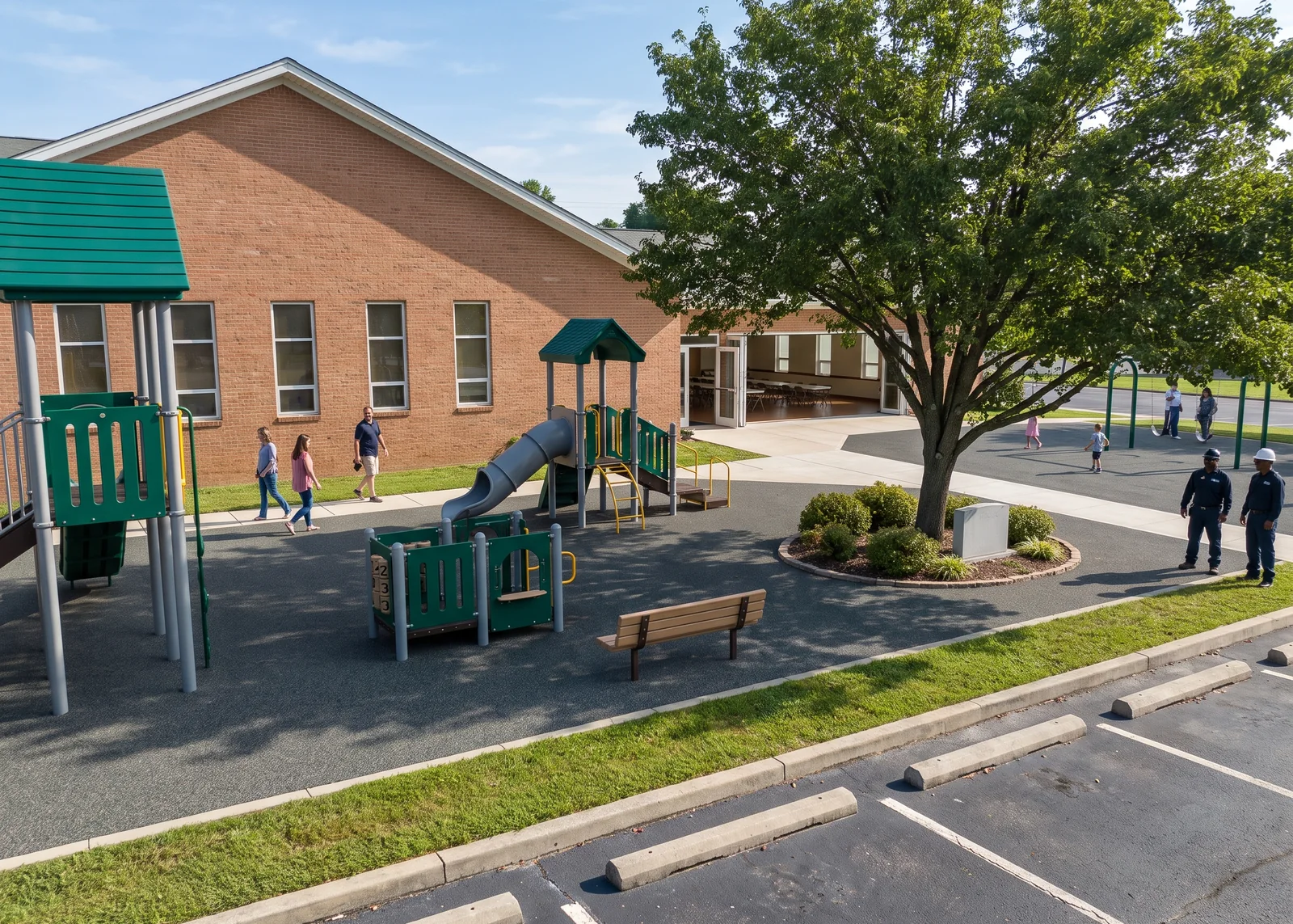 Church side wall, open side door and a compact playground on the lawn, with parking spaces along the bottom edge
