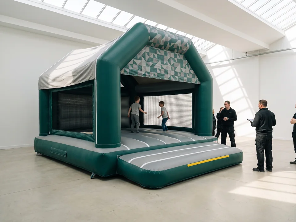 Commercial bounce house with netted side walls and a front entrance step