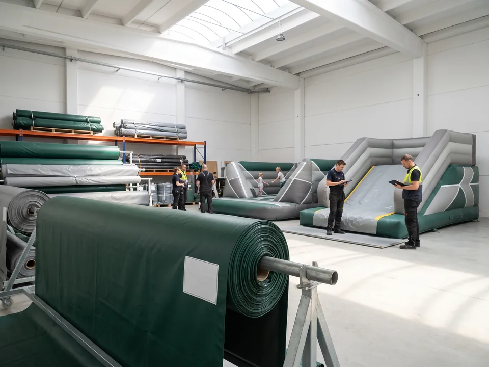 End of a roll of PVC tarpaulin with a white spec label