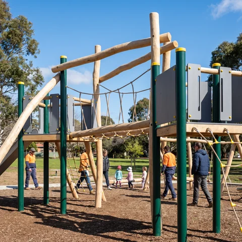 Debarked Robinia timber climbing frame in a park