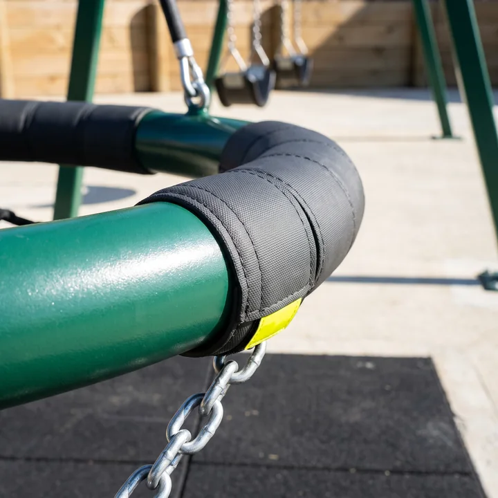 The stitched padding wrapped around the steel ring of a nest swing