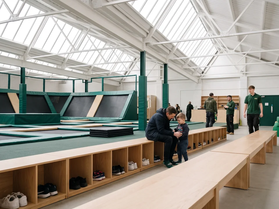 Sock and shoe benches with cubbies between the ticketing desk and the play zones