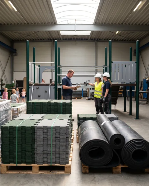 Stacks of rubber tiles and rolled EPDM