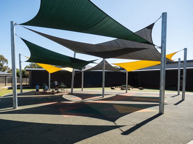 Shade sails stretched over a playground