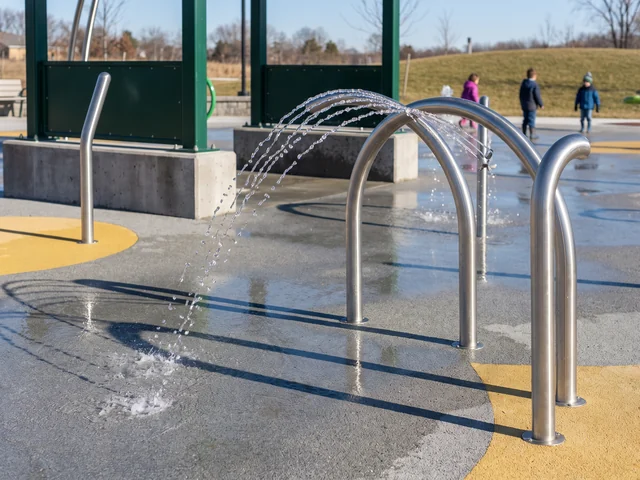 Stainless steel splash pad water features in a park