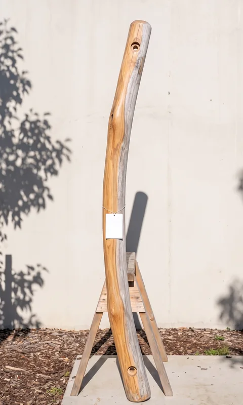 Timber piece L1-006, a Robinia brace, photographed with its part tag before loading