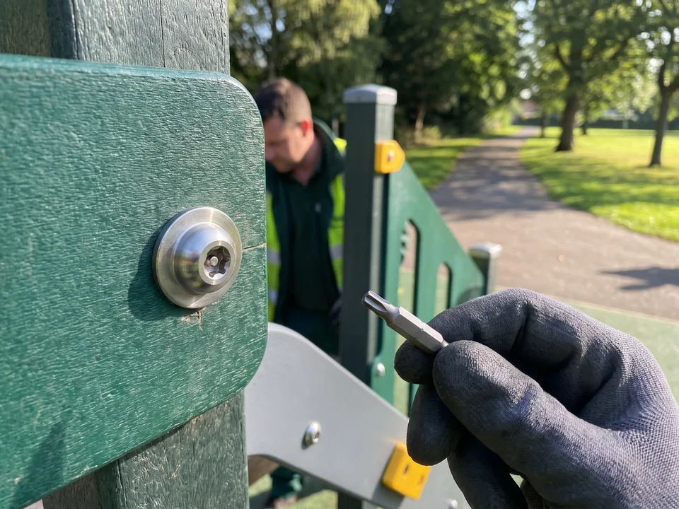 A capped stainless tamper-resistant fastener and the security bit that opens it