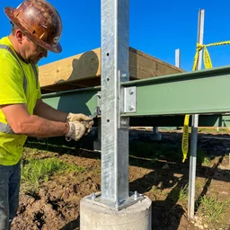 A phone snapshot of the deck-to-post connection the crew is working on
