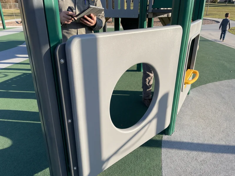 A round cut-out in an HDPE play panel