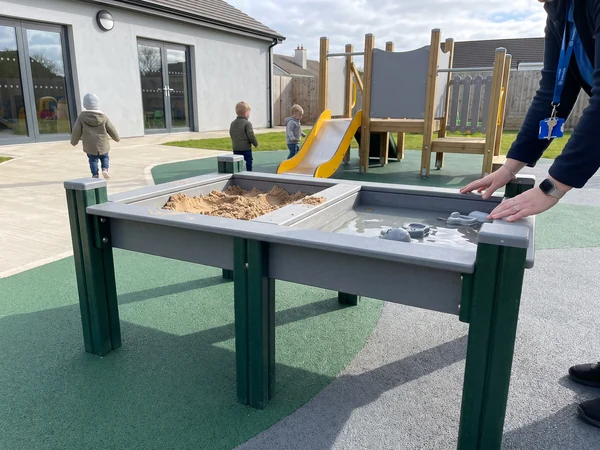 Sand and water play table at toddler height