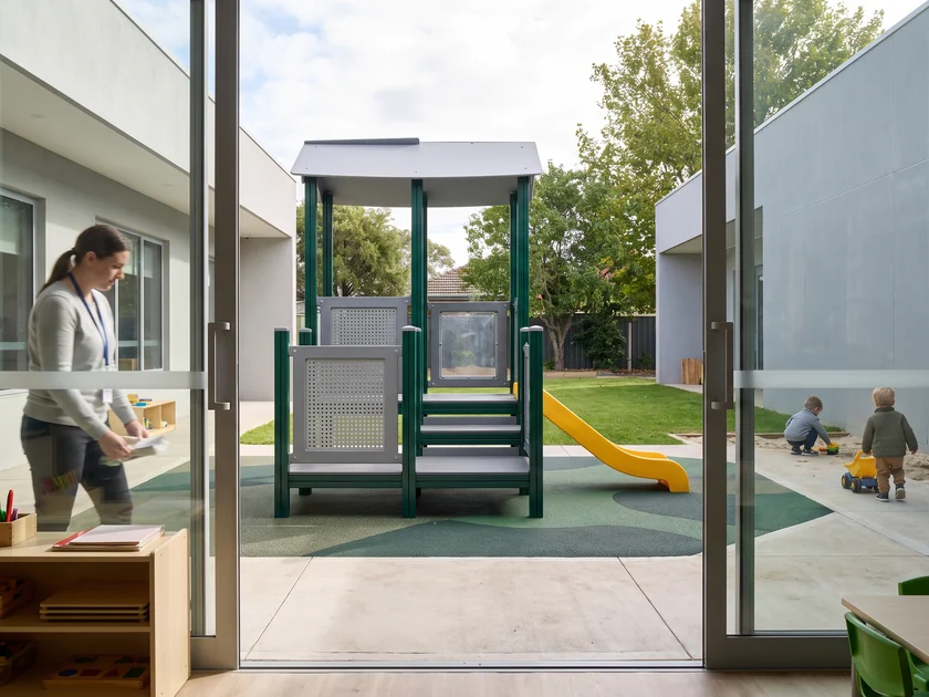Preschool room door opening onto the low-deck structure