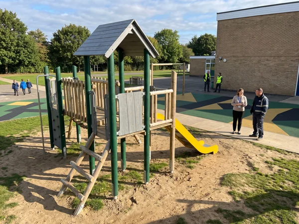 Debarked robinia timber climbing piece on a school playground
