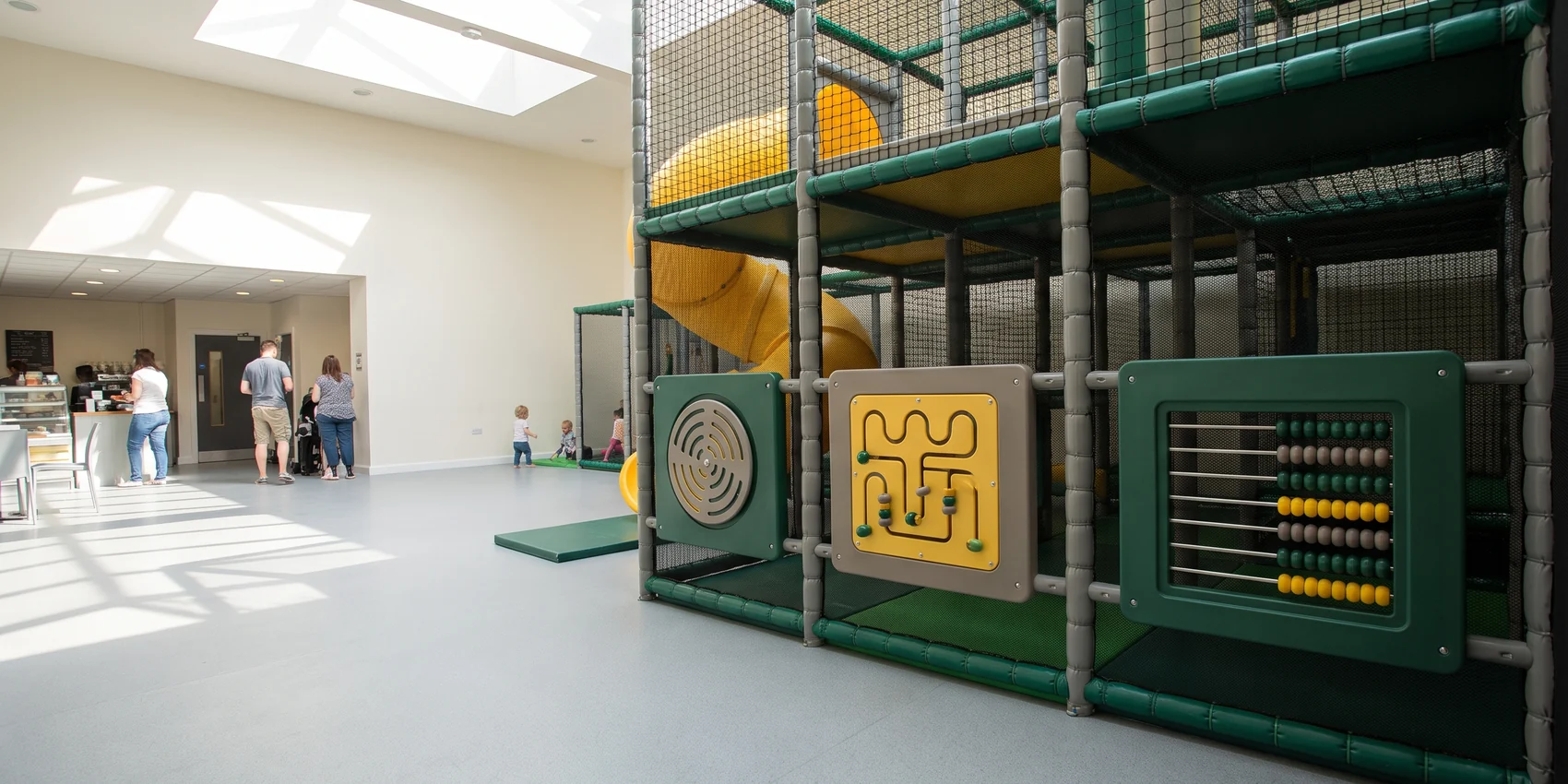 HDPE spinner, maze and abacus panels on a soft play structure