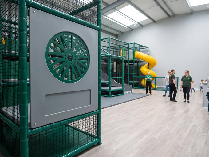 HDPE entrance sign panel with a dealer logo shape