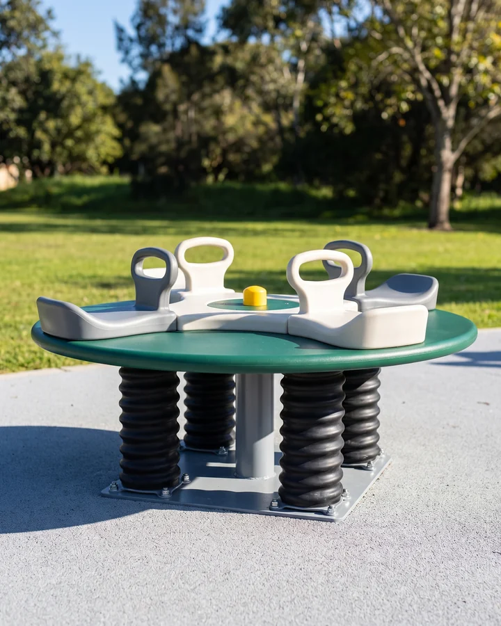 A four-seat platform spring rider standing on several springs
