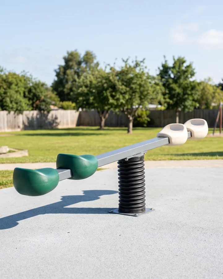 A multi-seat spring seesaw on a long beam over one center spring