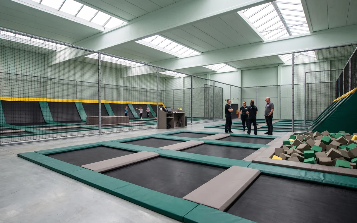 In-ground trampoline court level with the surrounding floor
